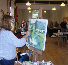 Lyn at her easel - completeing a french landscape